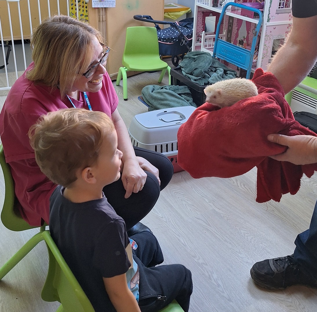 jozef-and-play-leader-lorraine-cassar-meet-an-albino-hedgehog-1700658900.jpg